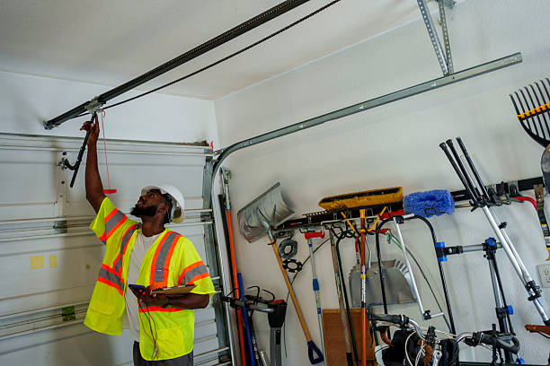 Professional Garage Door Panel Replacement technician working in Lee County County, IA